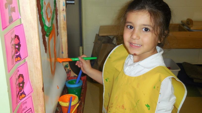 Young child painting